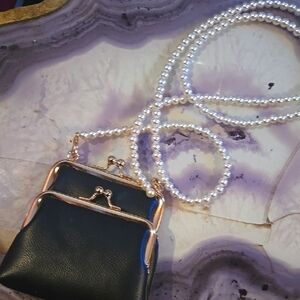 Elegant Black Leather Mini Bag with Pearl Strap